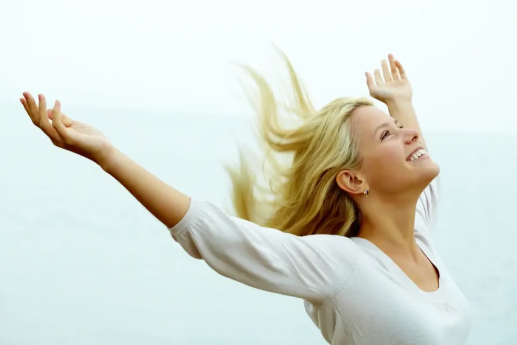 Woman with her arms in the air