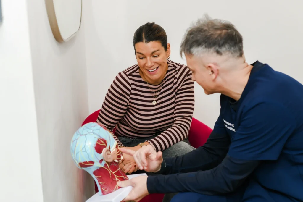 Stuart in a consultation with a client